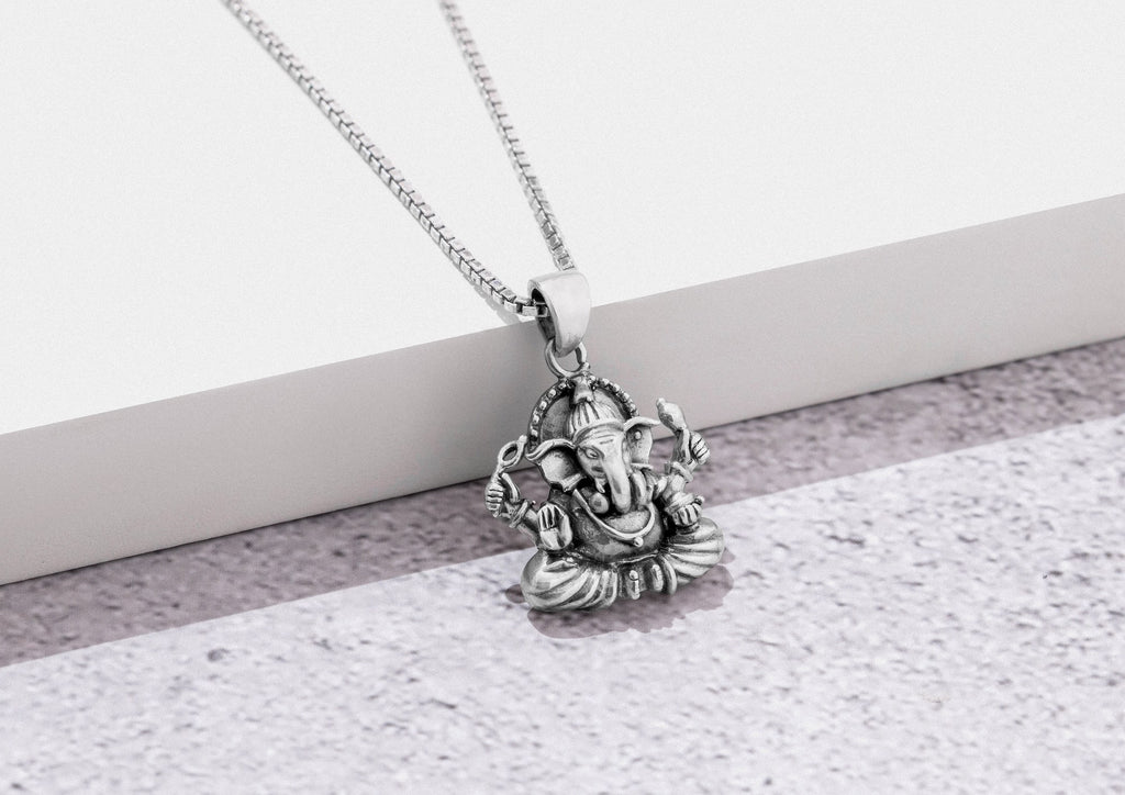 Seated Ganeshji Pendant In Silver By Orionz Jewels